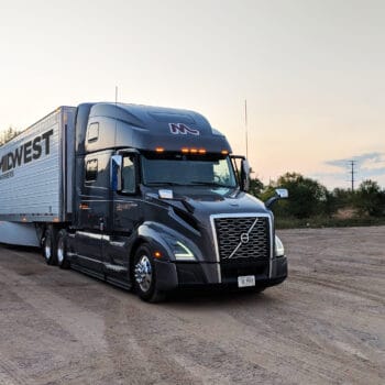 Midwest Carriers truck parked in a gravel lot